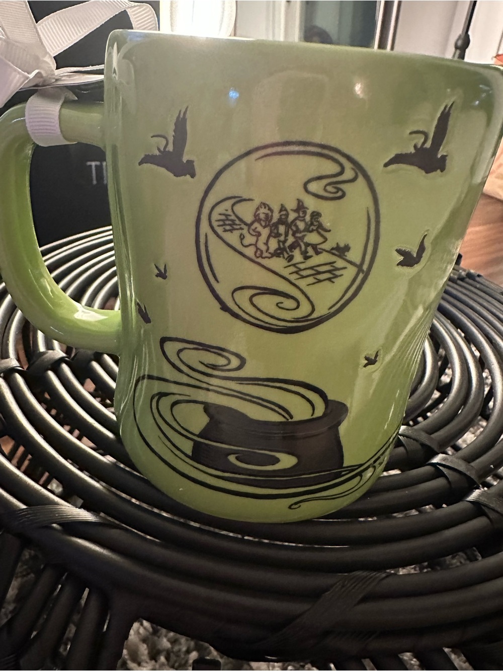 Rae Dunn Green Ceramic Coffee Mug with Black Artwork